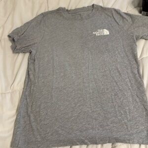 Grey and white north face shirt sleeve. Can iron before shipping.